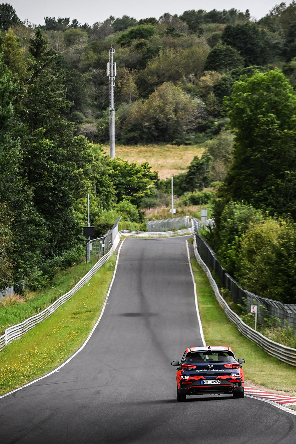 Hyundai N Taxi on a straight on the Nürburgring Nordschleife track
